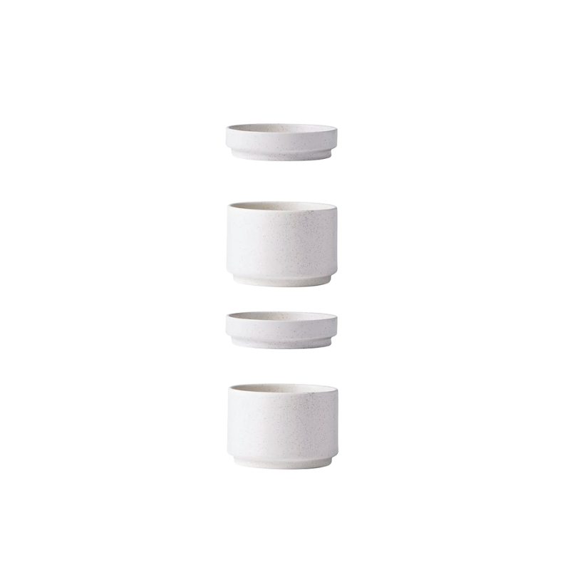 Made from fine stoneware in a lovely off-white color, the Setomono Container is a beautiful, minimalistic piece of tableware that is perfect for any occasion and table setting. The containers come in a set of two small dishes and two small bowls. Dishwasher and microwave safe. Available in two sizes. 