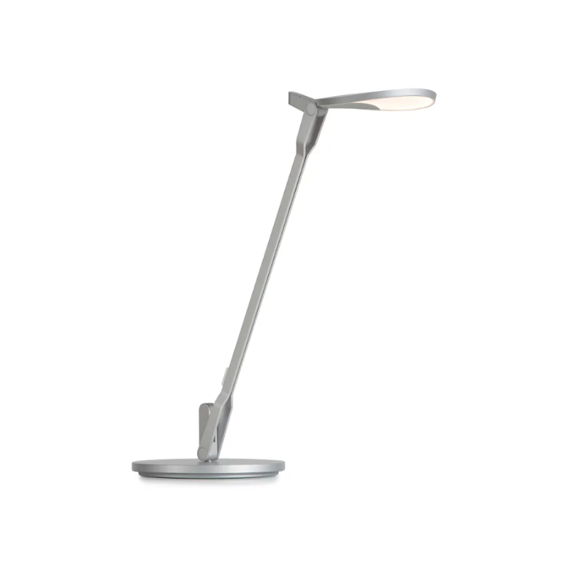 The Splitty Pro LED Desk Lamp from Koncept is a cool contemporary lamp with remarkable flexibility. This lamp is fully adjustable, with the ability to be contorted into any position you like. The frame is split into two sections, giving this lamp its namesake. Features a 2.0 Amp USB port for charging your devices, as well as a built-in occupancy sensor that turns the lamp on or off when motion is, or is not, detected.