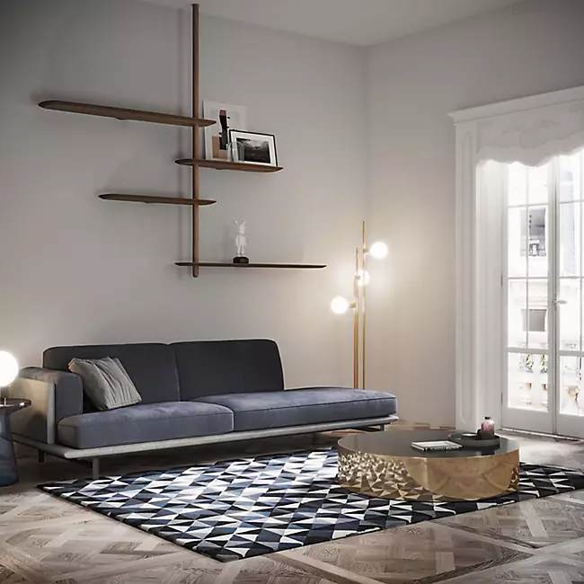 The Unica Ceiling Floating Shelving System from Nomon lends an airy, sculptural simplicity to its surroundings. An impeccably engineered Andres Martinez design that descends from above via a sleek downrod of solid walnut, it extends a series of slender, strong shelves with a smooth walnut veneer. 