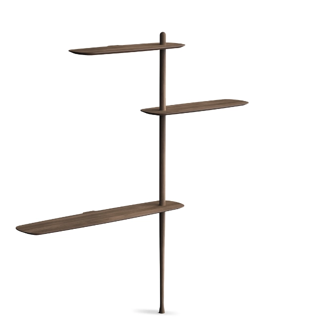 Rise in style with the smooth surfaces and open expressiveness of the Unica Floor Shelving System from Nomon. A smooth design from the mind of Andres Martinez, it ascends along a single solid walnut rod that telescopes out from a narrower point, seating alternating fixed and “floating” shelves with a smooth walnut veneer along its length. 
