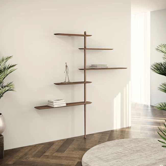 Rise in style with the smooth surfaces and open expressiveness of the Unica Floor Shelving System from Nomon. A smooth design from the mind of Andres Martinez, it ascends along a single solid walnut rod that telescopes out from a narrower point, seating alternating fixed and “floating” shelves with a smooth walnut veneer along its length. 