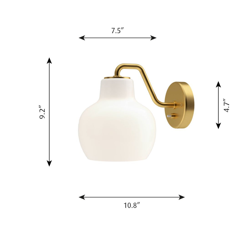 The VL Ring Crown wall sconce by Louis Poulsen has a characteristically organic form that emits light directed primarily downwards, while the opal glass provides a comfortable and uniform illumination of the area around the fixture.
