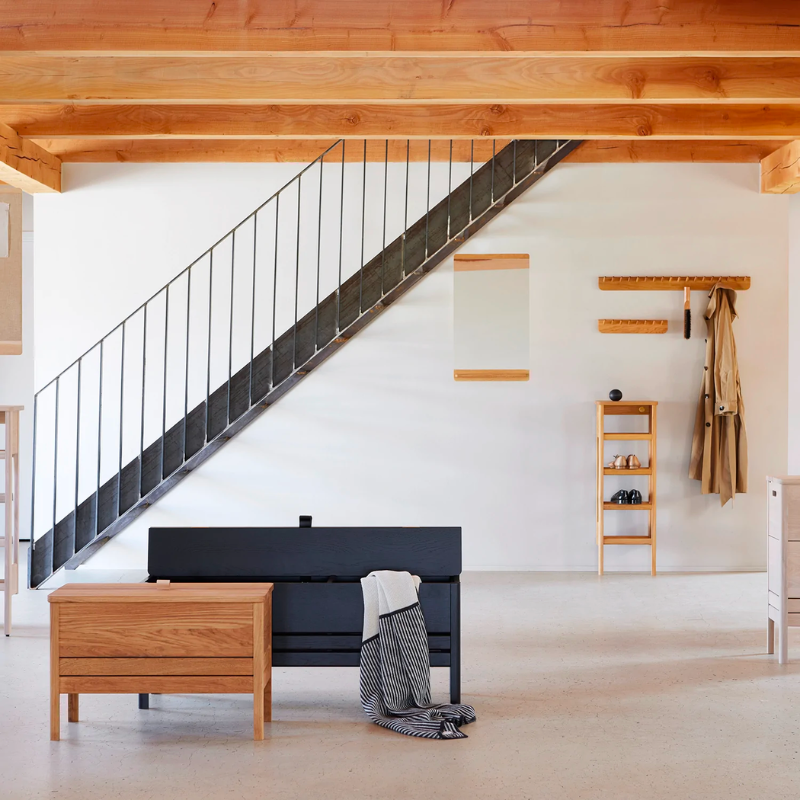 An updated version of the classic stowaway bench where functionality meets clean form. 