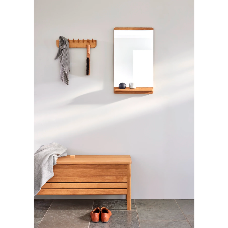 An updated version of the classic stowaway bench where functionality meets clean form. 