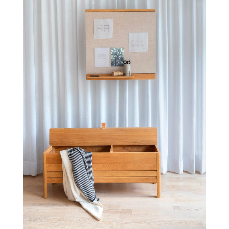 An updated version of the classic stowaway bench where functionality meets clean form. 