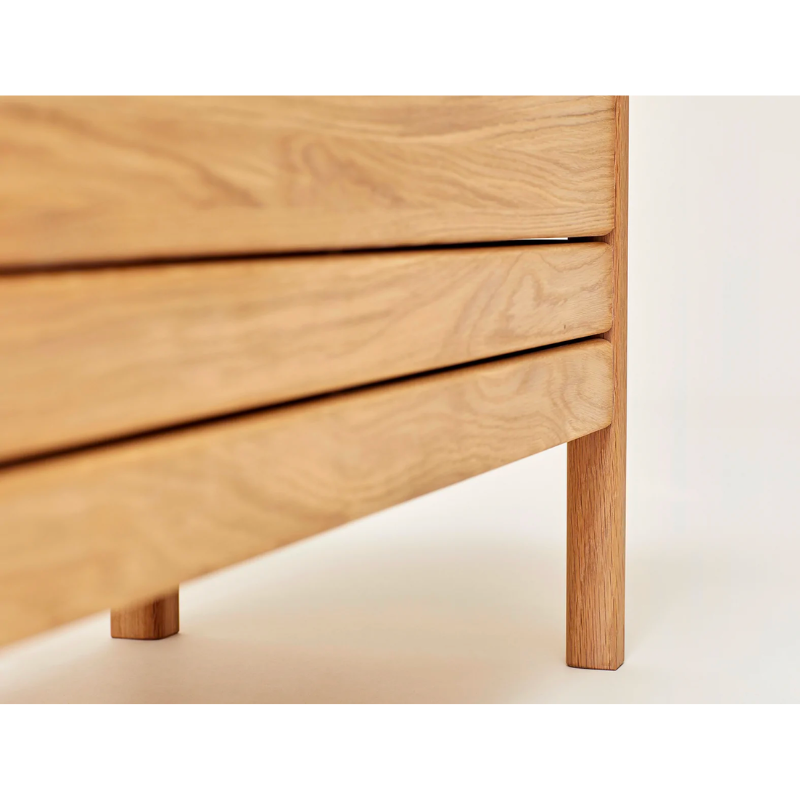 An updated version of the classic stowaway bench where functionality meets clean form. 