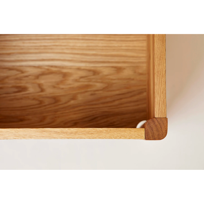 An updated version of the classic stowaway bench where functionality meets clean form. 