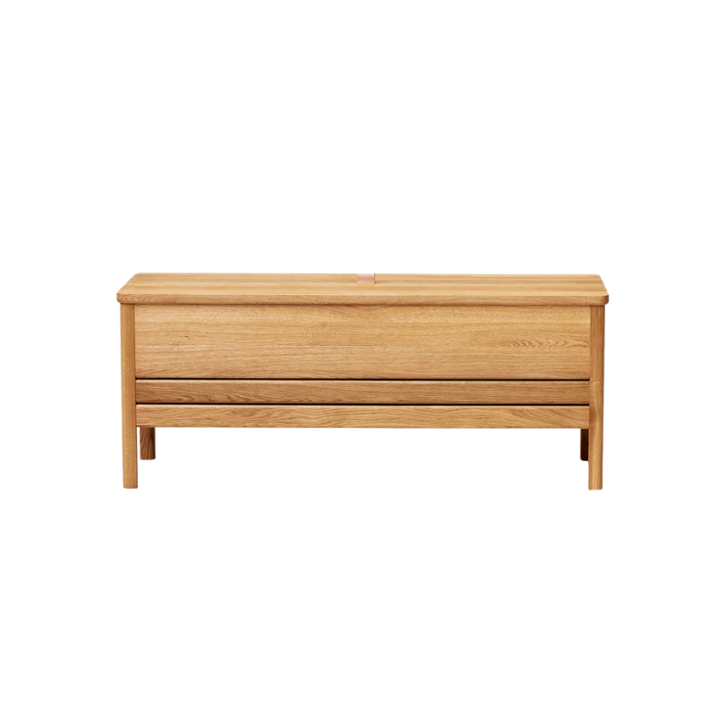 An updated version of the classic stowaway bench where functionality meets clean form. 