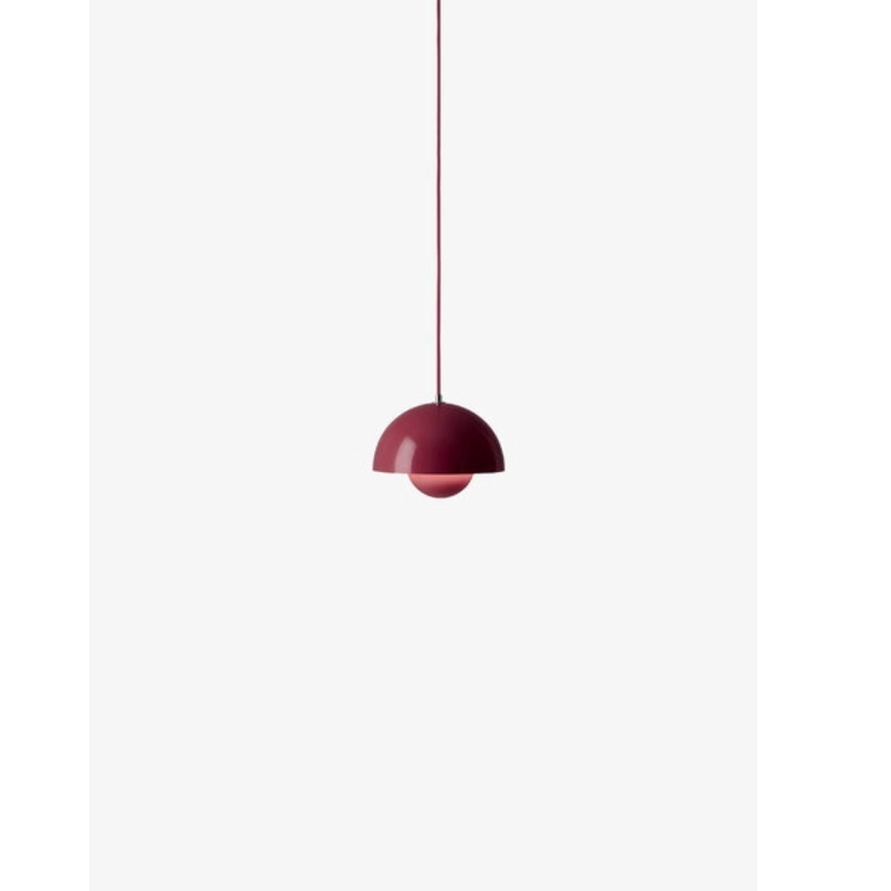 The Flowerpot VP1 Mini Pendant Light by Verner Panton became synonymous with the Flower Power movement from the late 60s. Reflecting a break from convention to embrace a more open, modern mentality that promoted peace and harmony. Such was the mindset of its designer, Verner Panton. One of the most forward-thinking talents of his time. The Flowerpot series consists of several different models, including three pendants and two table lamps - all in a wide range of colors.