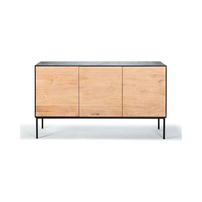 The Blackbird sideboard by Ethnicraft brings together opposing elements, combining soft round legs and eye-catching graphic lines into a light and airy design. Designed by Alain van Havre.