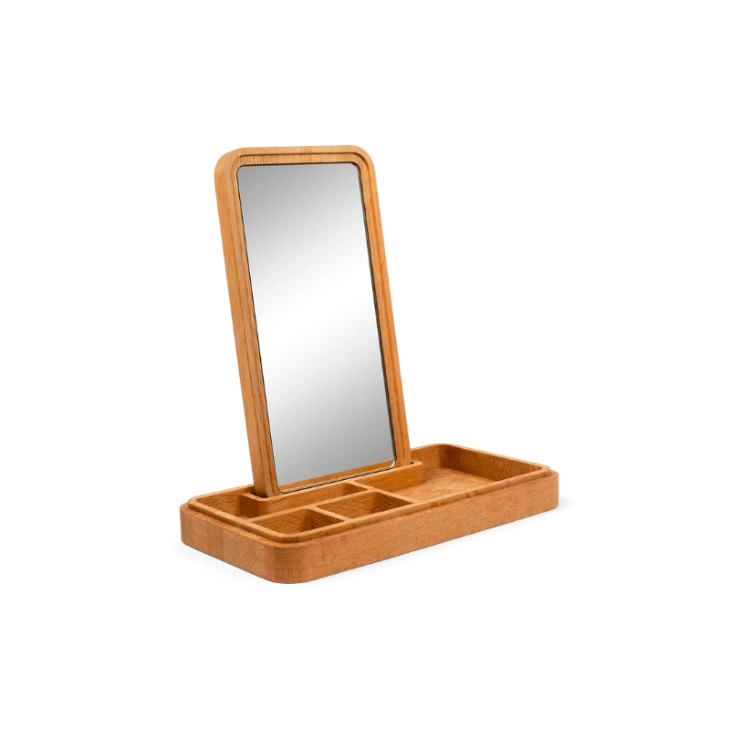 Mirror Box by Spring Copenhagen is a smart design that scores high on both aesthetics and functionality. The lid conceals a mirror, which you can place upright in the box. The box itself is split into smaller compartments, which are ideal for items such as jewelry, hair bands, keys, and cards. 
