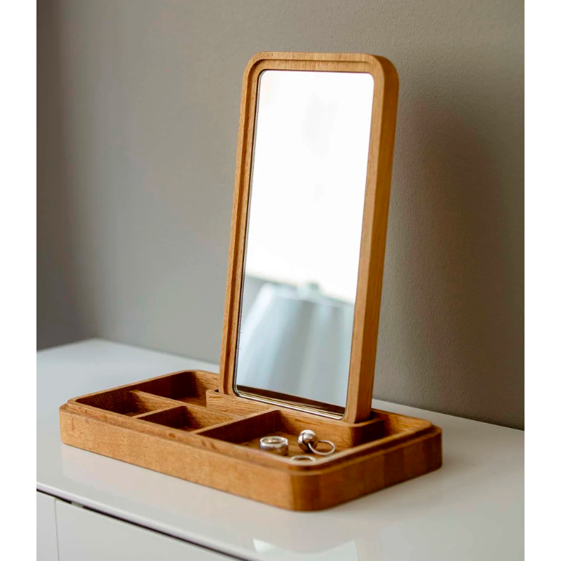 Mirror Box by Spring Copenhagen is a smart design that scores high on both aesthetics and functionality. The lid conceals a mirror, which you can place upright in the box. The box itself is split into smaller compartments, which are ideal for items such as jewelry, hair bands, keys, and cards. 