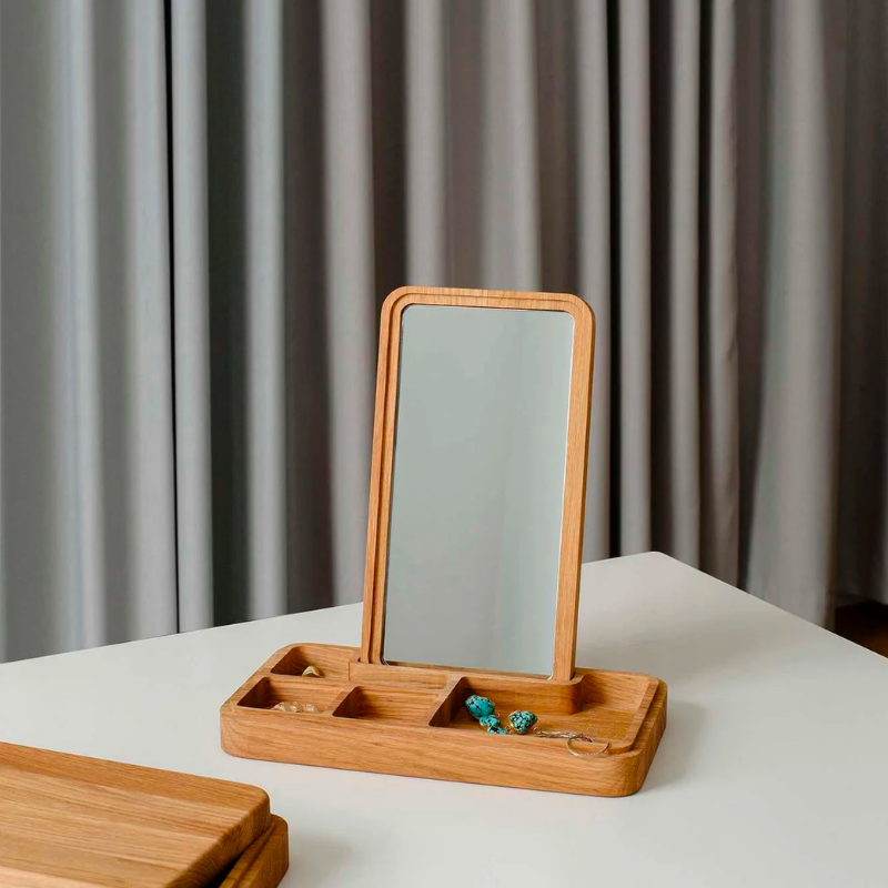 Mirror Box by Spring Copenhagen is a smart design that scores high on both aesthetics and functionality. The lid conceals a mirror, which you can place upright in the box. The box itself is split into smaller compartments, which are ideal for items such as jewelry, hair bands, keys, and cards. 