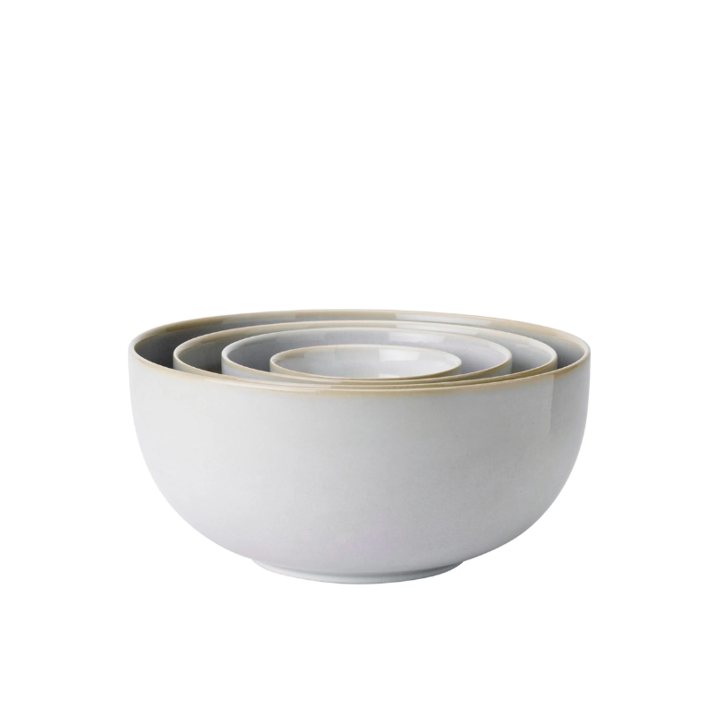 Tavola nesting bowl set 4-piece from Knabstrup Keramik contains four high-quality, round ceramic bowls designed with a beautiful and homey look. These bowls can be used as side dishes for a meal or as lovely snack bowls during more festive occasions. Tavola bowls are stackable and use minimal space when stored. Use other bowls from the same series to create a matching set.