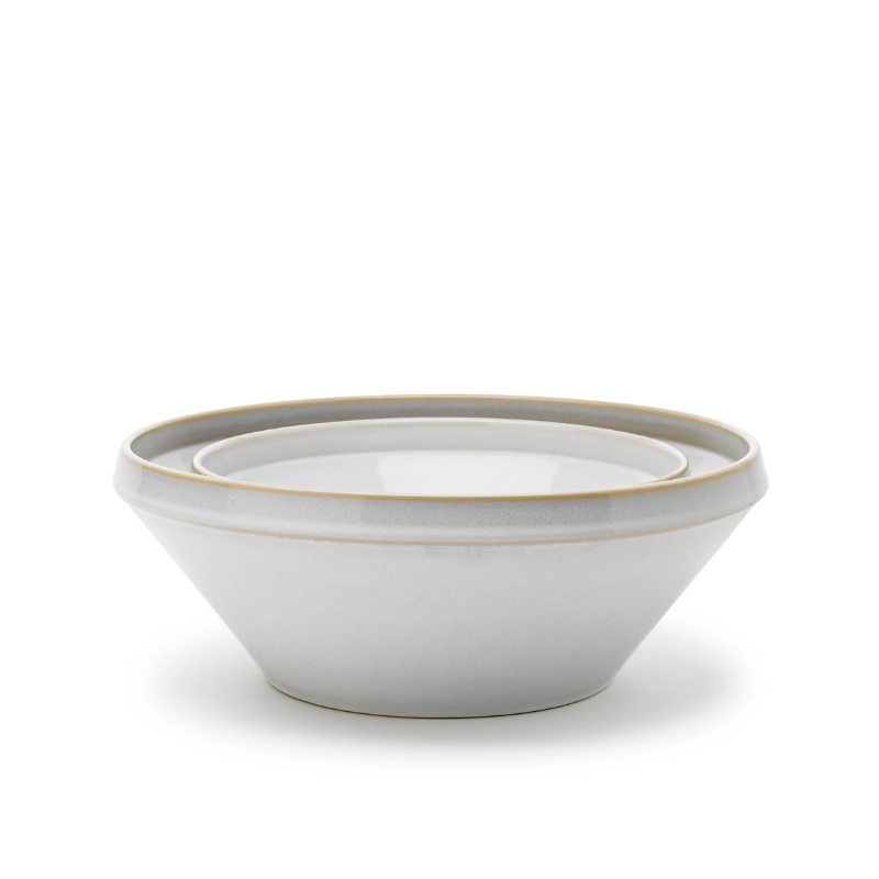 The Tavola nesting dish set from Knabstrup Keramik contains two high-quality, round ceramic bowls designed with a beautiful and homey look. These bowls can be used as side dishes for a meal or as lovely snack bowls during more festive occasions. Tavola dishes are stackable and use minimal space when stored. 