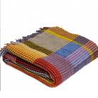 The Edith Honeycomb Throw from Wallace & Sewell made from 100% merino lambswool in the United Kingdom.