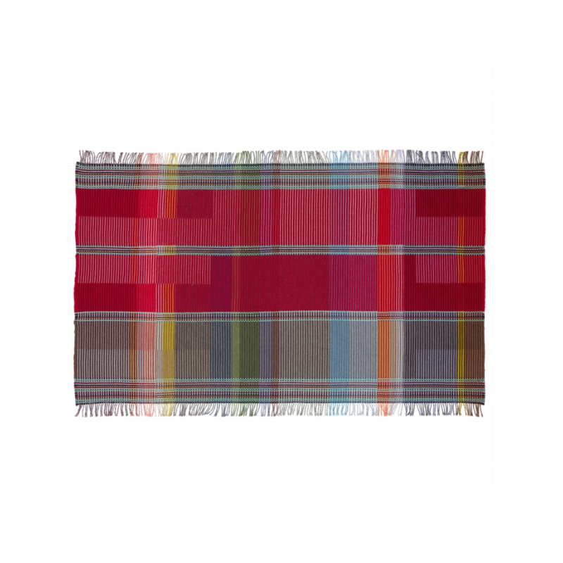 Woven in merino lambswool, Wallace & Sewell's Pinstripe throws combine bold-colored blocks with fine, detailed vertical stripes. This double-sided design also has a contrasting pixelated border and makes a stunning addition to a room.