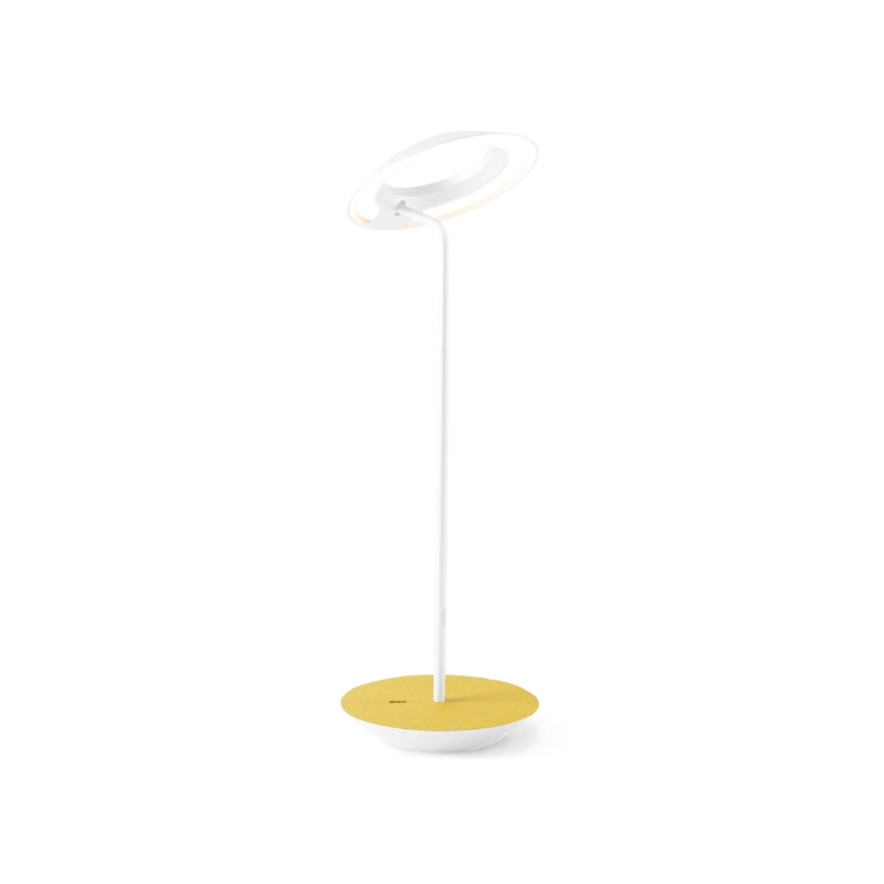 A simultaneously retro and modern desk lamp that combines elegance and inviting warmth. The Royyo Desk Lamp by Koncept will bring whimsy and charm to your desk, as well as super useful and energy-efficient LED illumination. Inventive simplicity is the value that holds together each piece of the desk lamp’s aesthetic, with a somewhat conical shade held at a distinct angle by a thin Aluminum stem. This is contrasted neatly by a distinctively shaped base.