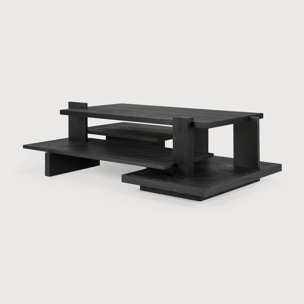 Inspired by the Dutch architectural movement de Stijl, the Abstract coffee table is not only centred around style, but also purpose. With its contemporary black finish discover new proportions and interest from every angle. Designed by Alain van Havre.