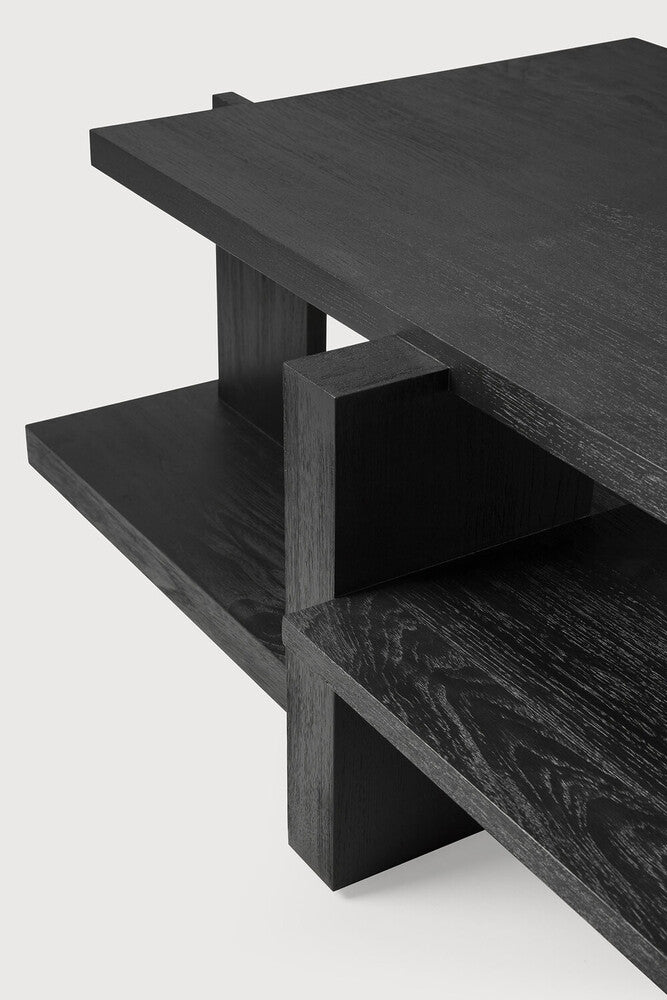 Inspired by the Dutch architectural movement de Stijl, the Abstract coffee table is not only centred around style, but also purpose. With its contemporary black finish discover new proportions and interest from every angle. Designed by Alain van Havre.