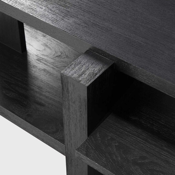 Inspired by the Dutch architectural movement de Stijl, the Abstract coffee table is not only centred around style, but also purpose. With its contemporary black finish discover new proportions and interest from every angle. Designed by Alain van Havre.