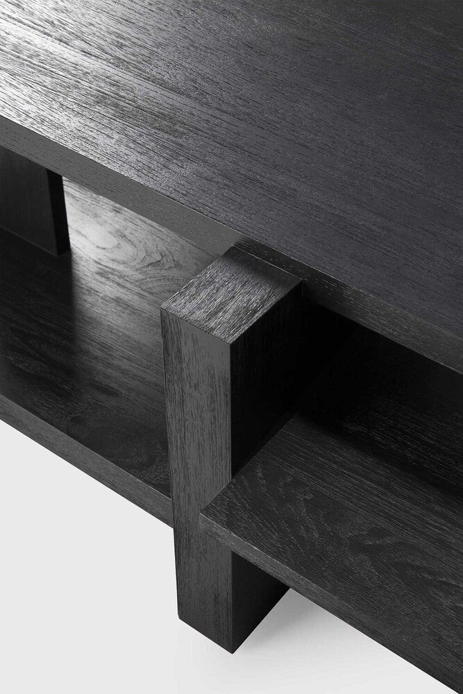 Inspired by the Dutch architectural movement de Stijl, the Abstract coffee table is not only centred around style, but also purpose. With its contemporary black finish discover new proportions and interest from every angle. Designed by Alain van Havre.