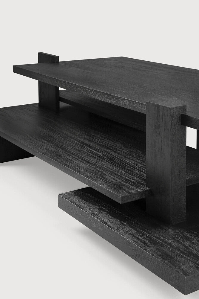 Inspired by the Dutch architectural movement de Stijl, the Abstract coffee table is not only centred around style, but also purpose. With its contemporary black finish discover new proportions and interest from every angle. Designed by Alain van Havre.