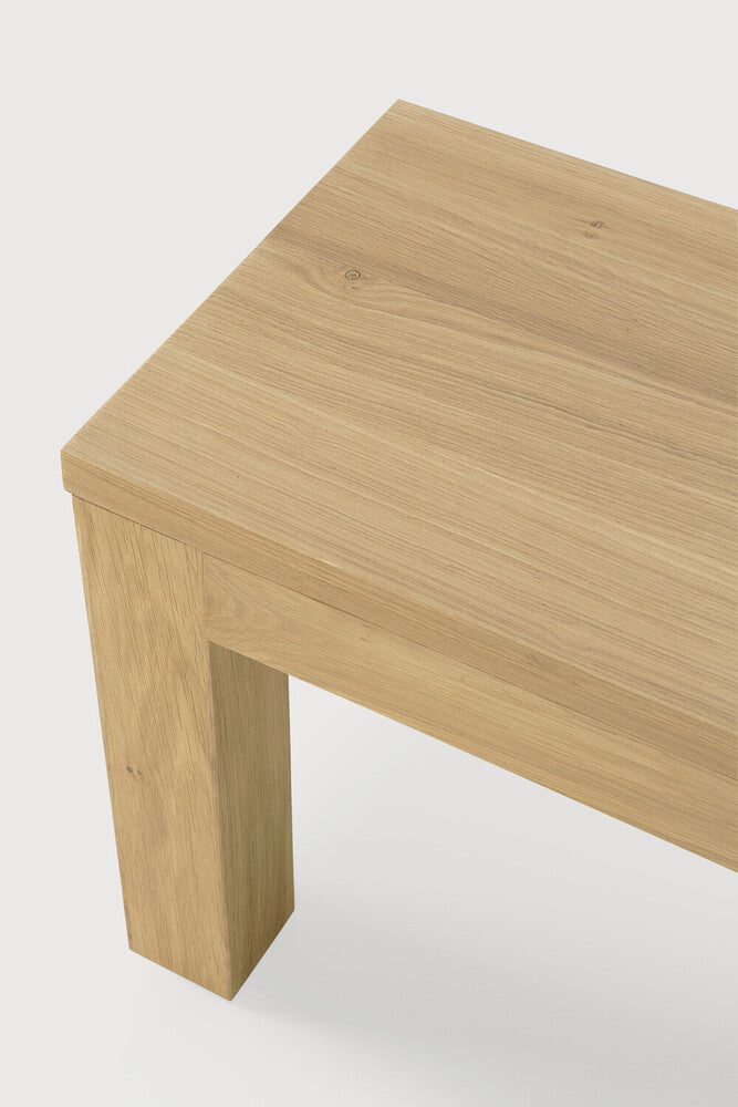 Ethnicraft's Straight Bench is cleverly designed to maximize seating space at the table. It's clean and contemporary style features simple lines that accentuate the sturdy shape of the bench. A beautiful addition to both dining settings or to display books and magazines in a decorative corner. 