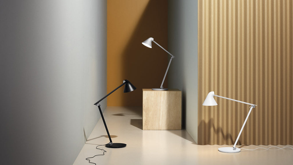 The NJP Table Lamp is a new interpretation of a classic architect lamp designed by Nendo design studio of Japan and designer Oki Sato. Its simple and honest look bares the lamp's functional components and makes it self-explanatory in its expression. The lamp features a timer function that can be set to turn the lamp off at after four or eight hours. Its ergonomic design and simple mechanical system provides great freedom of movement, so that light can always be set in the ideal position in the workspace.