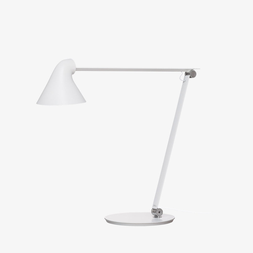 The NJP Table Lamp is a new interpretation of a classic architect lamp designed by Nendo design studio of Japan and designer Oki Sato. Its simple and honest look bares the lamp's functional components and makes it self-explanatory in its expression. The lamp features a timer function that can be set to turn the lamp off at after four or eight hours. Its ergonomic design and simple mechanical system provides great freedom of movement, so that light can always be set in the ideal position in the workspace.