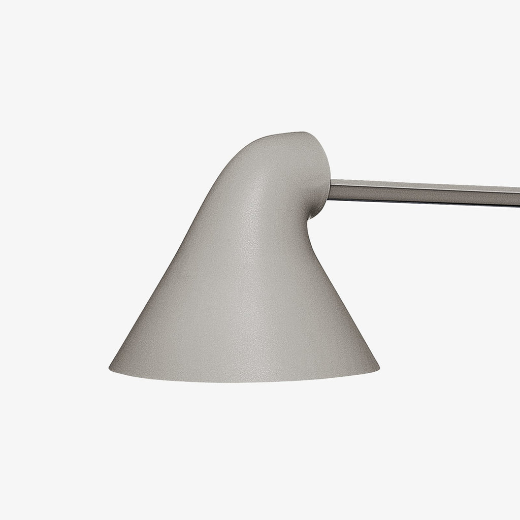 The NJP Table Lamp is a new interpretation of a classic architect lamp designed by Nendo design studio of Japan and designer Oki Sato. Its simple and honest look bares the lamp's functional components and makes it self-explanatory in its expression. The lamp features a timer function that can be set to turn the lamp off at after four or eight hours. Its ergonomic design and simple mechanical system provides great freedom of movement, so that light can always be set in the ideal position in the workspace.