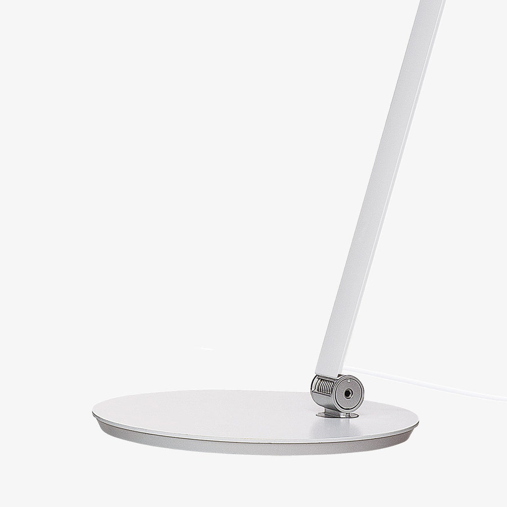 The NJP Table Lamp is a new interpretation of a classic architect lamp designed by Nendo design studio of Japan and designer Oki Sato. Its simple and honest look bares the lamp's functional components and makes it self-explanatory in its expression. The lamp features a timer function that can be set to turn the lamp off at after four or eight hours. Its ergonomic design and simple mechanical system provides great freedom of movement, so that light can always be set in the ideal position in the workspace.