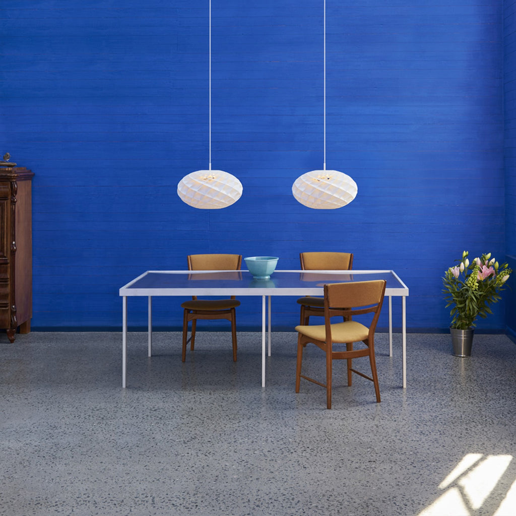 The timeless Patera Oval Pendant follows the same elegant design principles as the circular Patera Pendant and is assembled entirely by hand. Danish designer Øivind Slaatto took inspiration from the Fibonacci spiral and designed the pendant to following the mathematic structure of the captivating Fibonacci spiral.