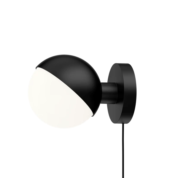 The VL Studio Wall light by Louis Poulsen emits a glare-free, diffused light. The triple-layered opal glass provides a pleasant and uniform illumination of the area around the fixture. The lamp shade can be tilted 90 degrees to the right or left, which allows for flexible light distribution.
