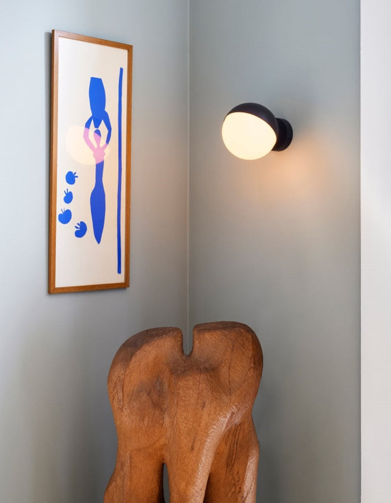 The VL Studio Wall light by Louis Poulsen emits a glare-free, diffused light. The triple-layered opal glass provides a pleasant and uniform illumination of the area around the fixture. The lamp shade can be tilted 90 degrees to the right or left, which allows for flexible light distribution.