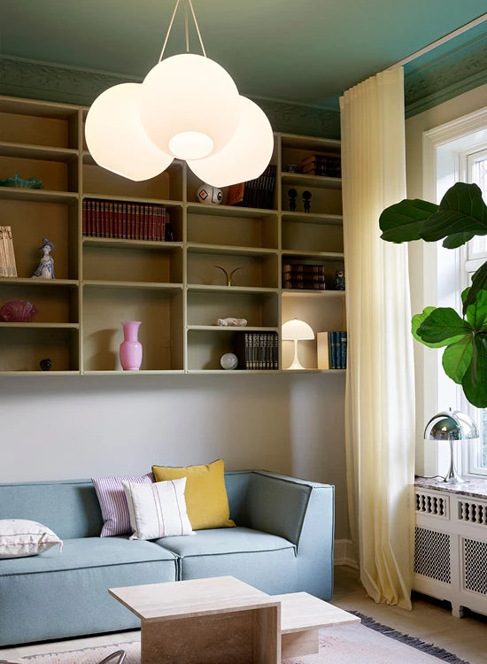 Designed by Danish architect Vilhelm Wohlert, the Louis Poulsen Wohlert Pendent features a simple and timeless globe design. The fixture provides uniform, general and diffused illumination. The opening at the bottom of the glass produces downwards directed light. The quality of the glass ensures that the fixture is evenly lit with its diffused warm glow. A ceiling canopy and suspension cable compliment the fixture's contemporary aesthetic and looks great suspended in clusters or as a singular pendant. 