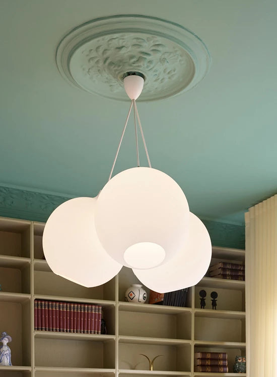 Designed by Danish architect Vilhelm Wohlert, the Louis Poulsen Wohlert Pendent features a simple and timeless globe design. The fixture provides uniform, general and diffused illumination. The opening at the bottom of the glass produces downwards directed light. The quality of the glass ensures that the fixture is evenly lit with its diffused warm glow. A ceiling canopy and suspension cable compliment the fixture's contemporary aesthetic and looks great suspended in clusters or as a singular pendant. 