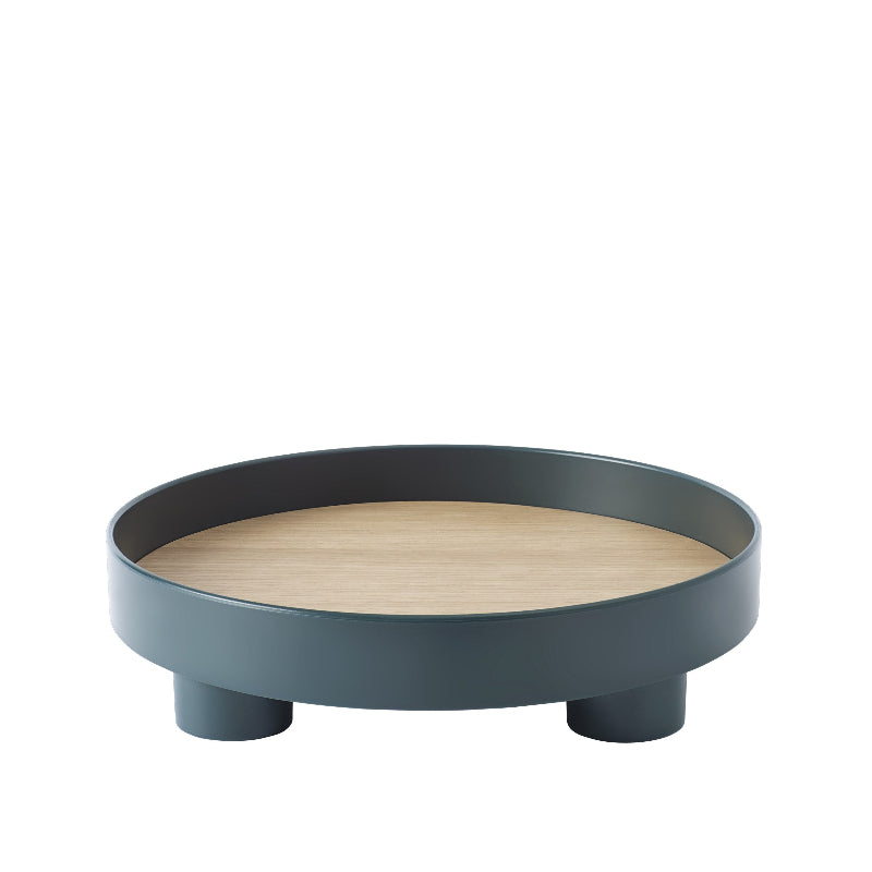 The Platform Tray by Muuto in dark green.